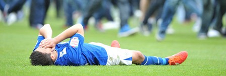 We miss. They score. The rest is noise. Anthony Knockheart lies defeated, seconds after missing Leicester's penalty (picture courtesy of the Leicester Mercury).